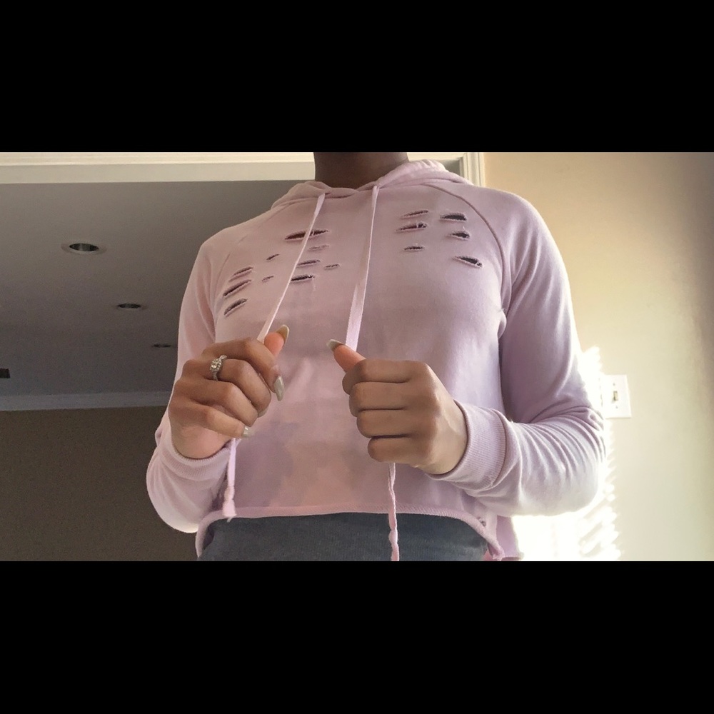 Pink distressed hoodie.